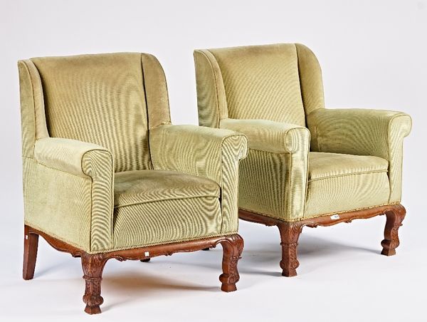 A pair of beech framed square back easy armchairs on carved scroll supports, 84cm wide x 97cm high (2).