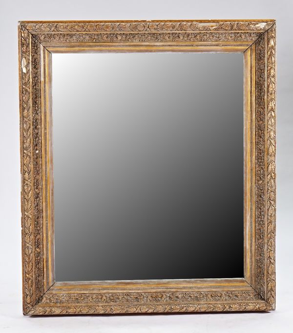 A large Victorian gilt framed mirror with foliate chase frame, 133cm wide x 155cm high.