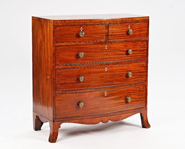 A Regency mahogany bowfront chest with two short and three long graduated drawers on splayed bracket feet, 102cm wide x 108cm high.