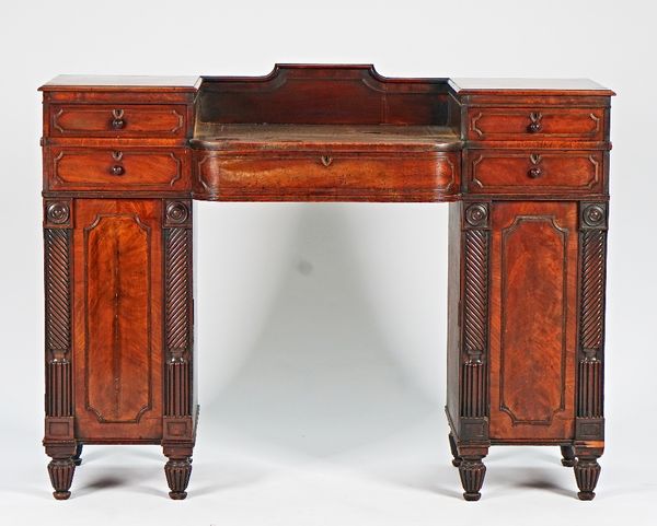 A Regency Scottish mahogany pedestal sideboard