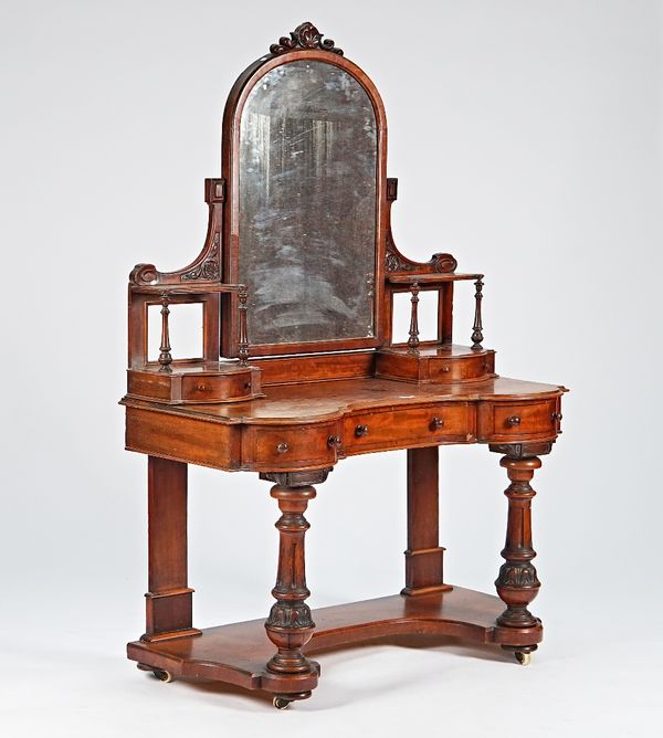 A Victorian mahogany Duchess dressing table with an arrangement of five drawers on fluted supports, 126cm wide x 180cm high.