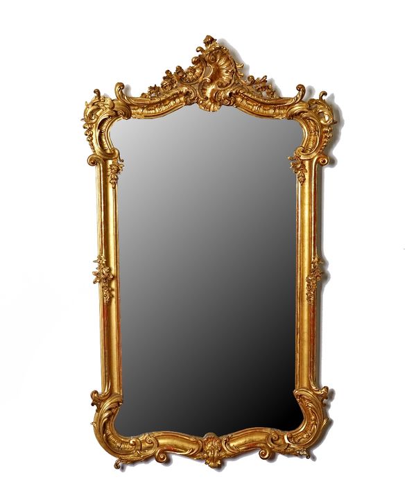 A 19th century gilt framed mirror with asymmetric scroll crest and bevelled mirror plate, 88cm wide x 150cm high.