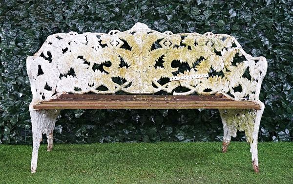 After Coalbrookdale, a white painted cast iron Fern & Berry pattern garden bench, 150cm wide x 91cm high, (a.f)