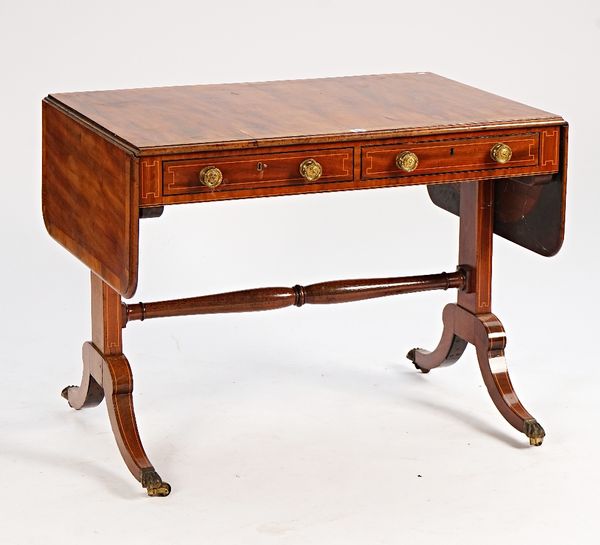 A Regency rosewood banded mahogany sofa table