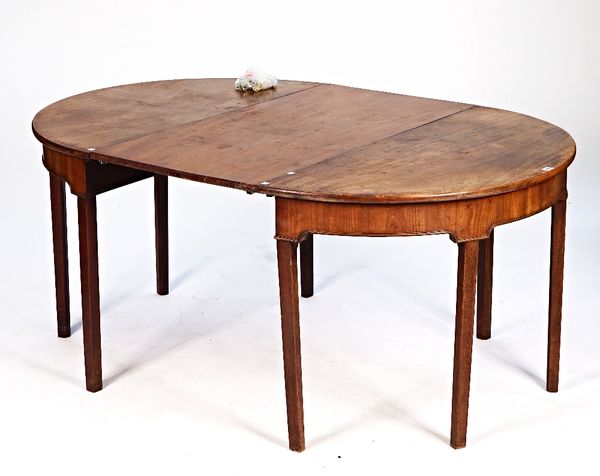 A George III mahogany D-end  dining table