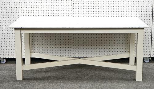 A marble topped rectangular preparation table on white painted block supports, united by X frame stretcher, 85cm wide x 180cm long.
