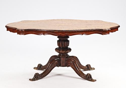 A shaped floral marquetry inlaid figured walnut centre table