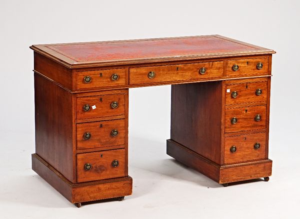 A 19th century mahogany pedestal desk with nine drawers about the knee, 120cm wide x 66cm deep.