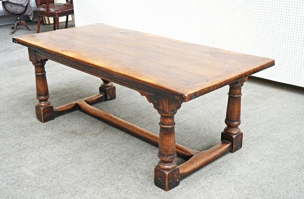 A 17th century style oak refectory table.