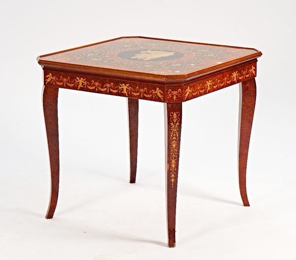 An Italian marquetry inlaid figural walnut games table.