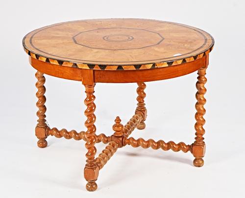 A 19th century French circular centre table top marquetry inlaid with figures on barley-twist supports, 109cm diameter x 72cm high.