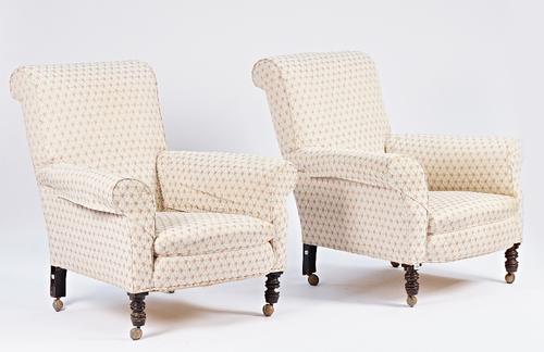 A pair of late Victorian easy armchairs on turned mahogany supports, 90cm wide x 90cm high (2).