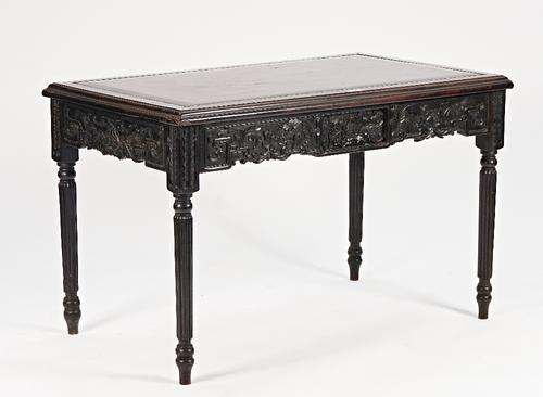 Chinese export, a late 19th/early 20th century ebony rectangular writing table with single drawer on reeded supports, 126cm wide x 79cm high.