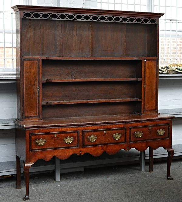 A George III inlaid oak dresser