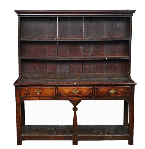 A George III oak dresser, the enclosed two tier plate rack over three frieze drawers, united by pot board undertier, 160cm wide x 176cm high.