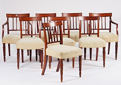 A set of eight Regency mahogany dining chairs on tapering reeded supports and a pair of carvers, (8).