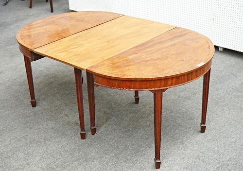 A George III mahogany D-end dining table