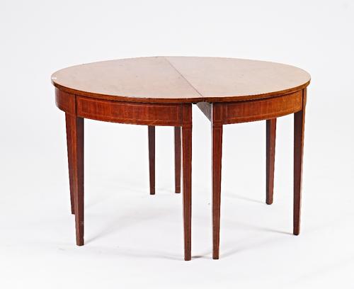 A George III inlaid mahogany D-end extending dining table
