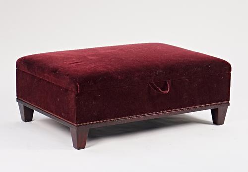 George Smith, a burgundy upholstered rectangular lift top footstool.