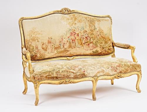 A Louis XV style gilt framed three piece salon suite (3).
