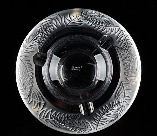 `Fougères': a Lalique clear and frosted glass ashtray, designed in 2001, signed Lalique France, 21cm. diameter.