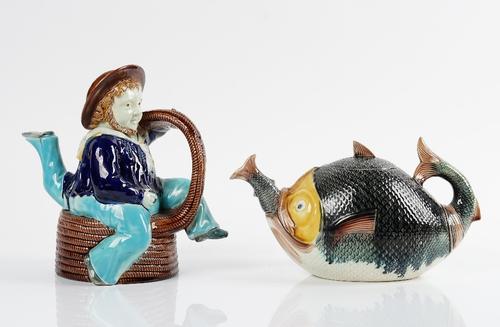 A majolica Isle of Man novelty teapot and cover, late 19th century, probably William Brownfield and made for W.Broughton of Douglas, modelled as a...