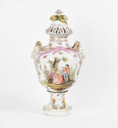 A large Carl Thieme, Potschappel, two-handled vase and cover, late 19th century, set with rams mask handles, the body painted each side with figures...