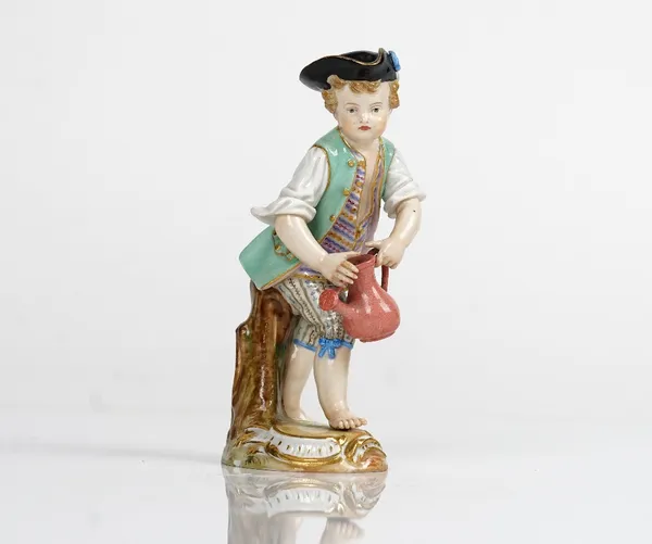 A Meissen figure of a boy gardener, late 19th century, modelled standing before a tree stump with a watering can, blue crossed swords mark, incised...