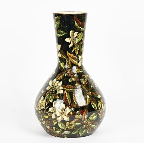 An early Doulton faience vase by Mary Butterton, dated 1877