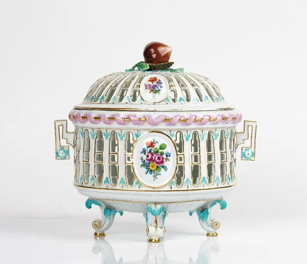 A Meissen pierced oval two-handled chestnut basket and cover, late 19th century, painted with flower panels, the cover with a chestnut modelled knop,...