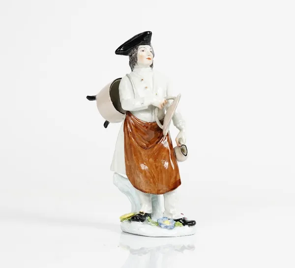 A porcelain figure of a laundryman, possibly Samson, late 19th century, after a Meissen model by J.J. Kaendler and Peter Reinicke, standing wearing a...