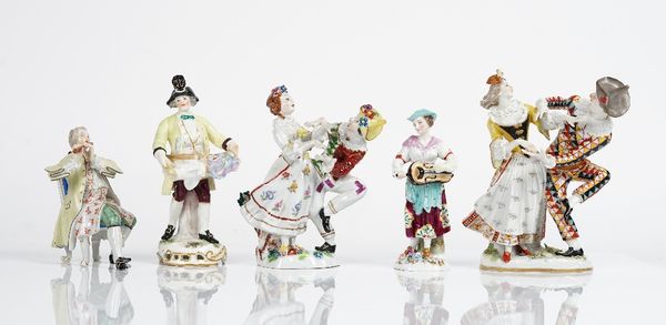 A group of Continental porcelains, late 19th/20th century, comprising; two groups of Harlequin and Columbine dancing; a seated flautist; a Samson...