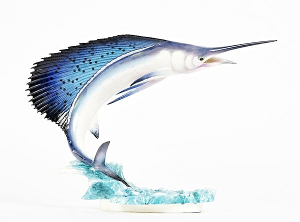 A Royal Worcester model of a sailfish, circa 1962, modelled by R. Van Ruyckevelt, no.326/ 500, printed marks, 20cm. high, with certificate and...