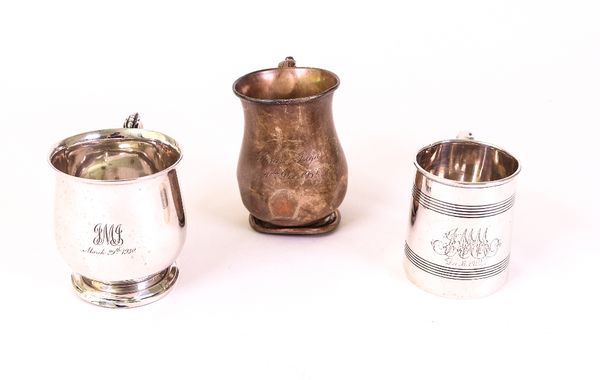 A silver christening mug, having a foliate capped handle, Birmingham 1932, a silver christening mug, decorated with reeded bands and with a 'C'...