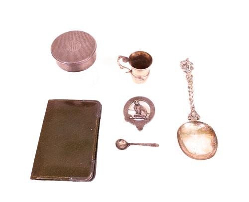 An Art Deco silver mounted cylindrical glass toilet jar, London 1927, engine turned, 6cm diameter, monogrammed, a Dutch cast silver fancy spoon,...