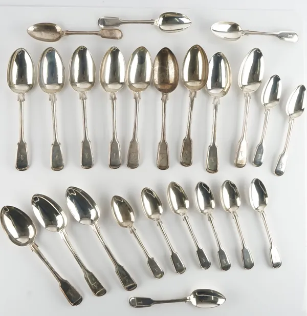 A group of silver spoons, comprising;