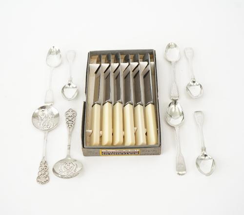 A pair of silver spoons and other flatware, (14).