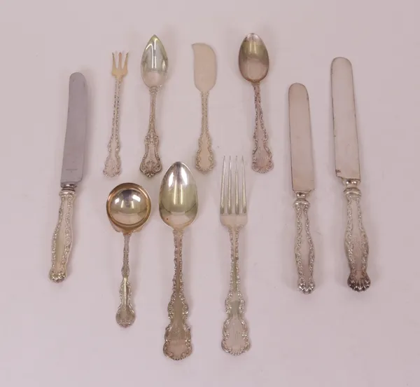 An American Sterling part table service, comprising; twelve teaspoons, thirty-four forks in two sizes, twelve dessert spoons,