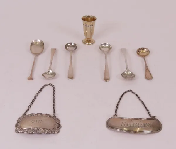 Silver, comprising; four salt spoons, a teaspoon, a Sterling salt spoon, an Irish decanter label detailed Sherry, Dublin 1811,
