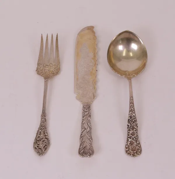 A Sterling serving slice, a Sterling serving fork, with floral pierced decoration to the handle and a Sterling serving spoon, with floral decoration