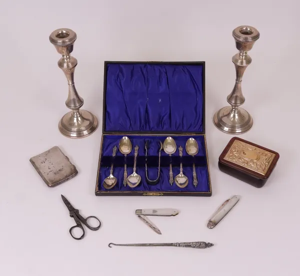 Silver and silver mounted wares, comprising; a pair of table candlesticks, Birmingham 1978, height 20.5cm (loaded), a set of six figure terminal...