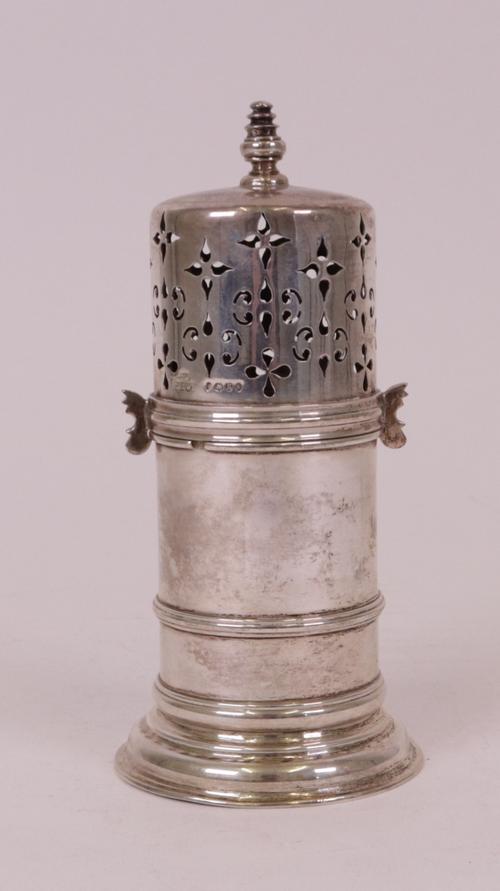 A Victorian silver sugar caster, in an early 18th century inspired design, London 1885, height 15.5cm, weight 187 gms.  7057