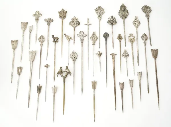 A collection of thirty-seven plated skewers, in a variety of designs, (37) Part 7087