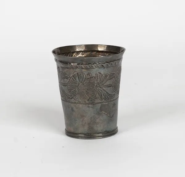 A European beaker, of tapered cylindrical form, decorated with a bold floral and foliate band