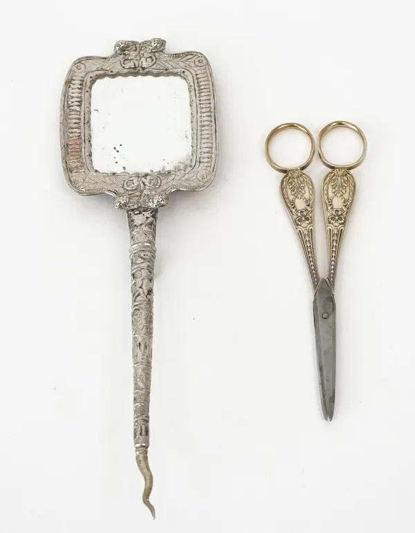 A pair of grape scissors and a mirror, (2).