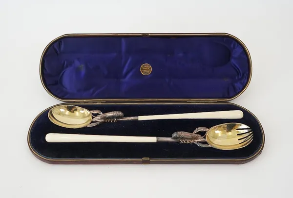 A pair of Victorian silver salad servers