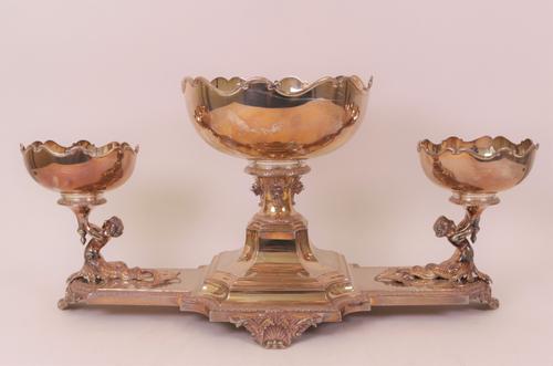 A silver table centrepiece.