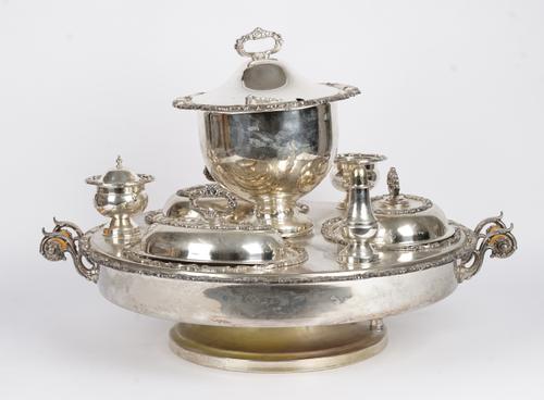 A plated dining table twin handled rotating centrepiece food stand,