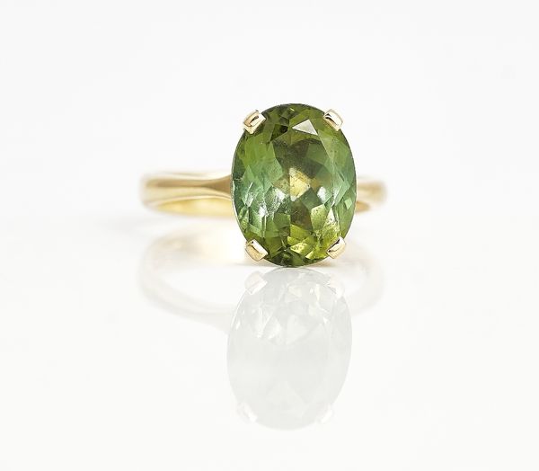 An 18ct gold and andalusite single stone ring.