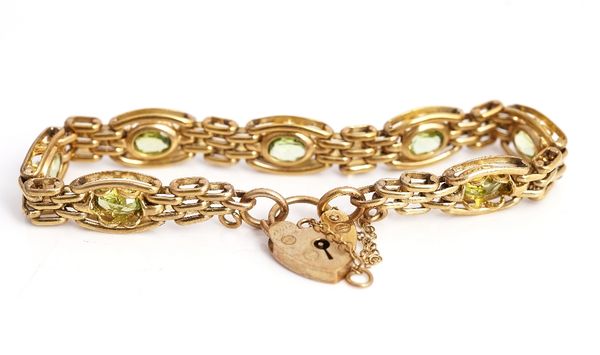 A 9ct gold and peridot bracelet.